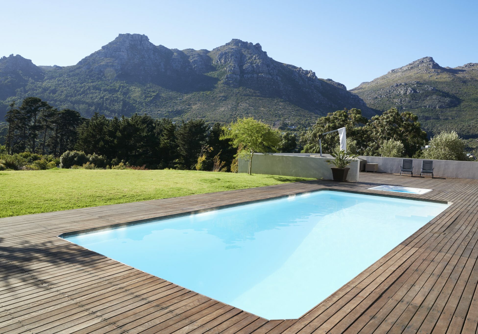 Outdoor Swimming Pool Surrounded With Wooden Decking